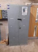 Tall Metal double door cabinet with contents of various consumables and spares etc.,