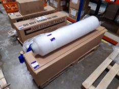 Pallet containing various rolls of woven fabric/material