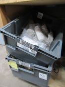 A box of Mil-tex multifunctional head scarfs and a box of decontamination kits