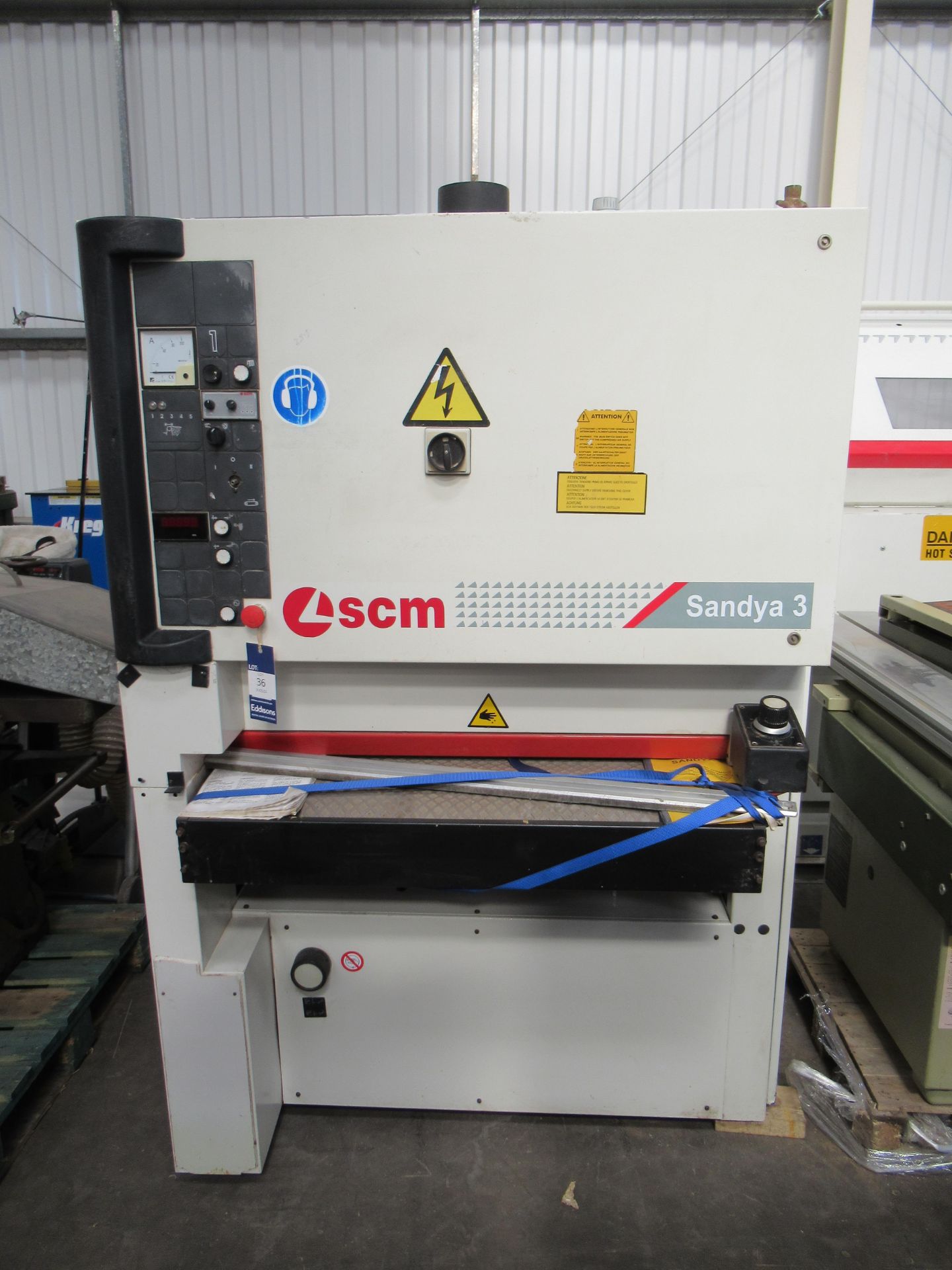 SCM Sandya 3 belt Sander S/N AE/026071, YOM 2004, 400V, 50HZ. Please note there is a £10 plus VAT Li