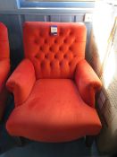 Upholstered button backed armchair with wool legs