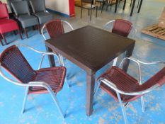 Brown outdoor table 800 x 800mm with 4 "wicker style" steel tubular framed arm chairs