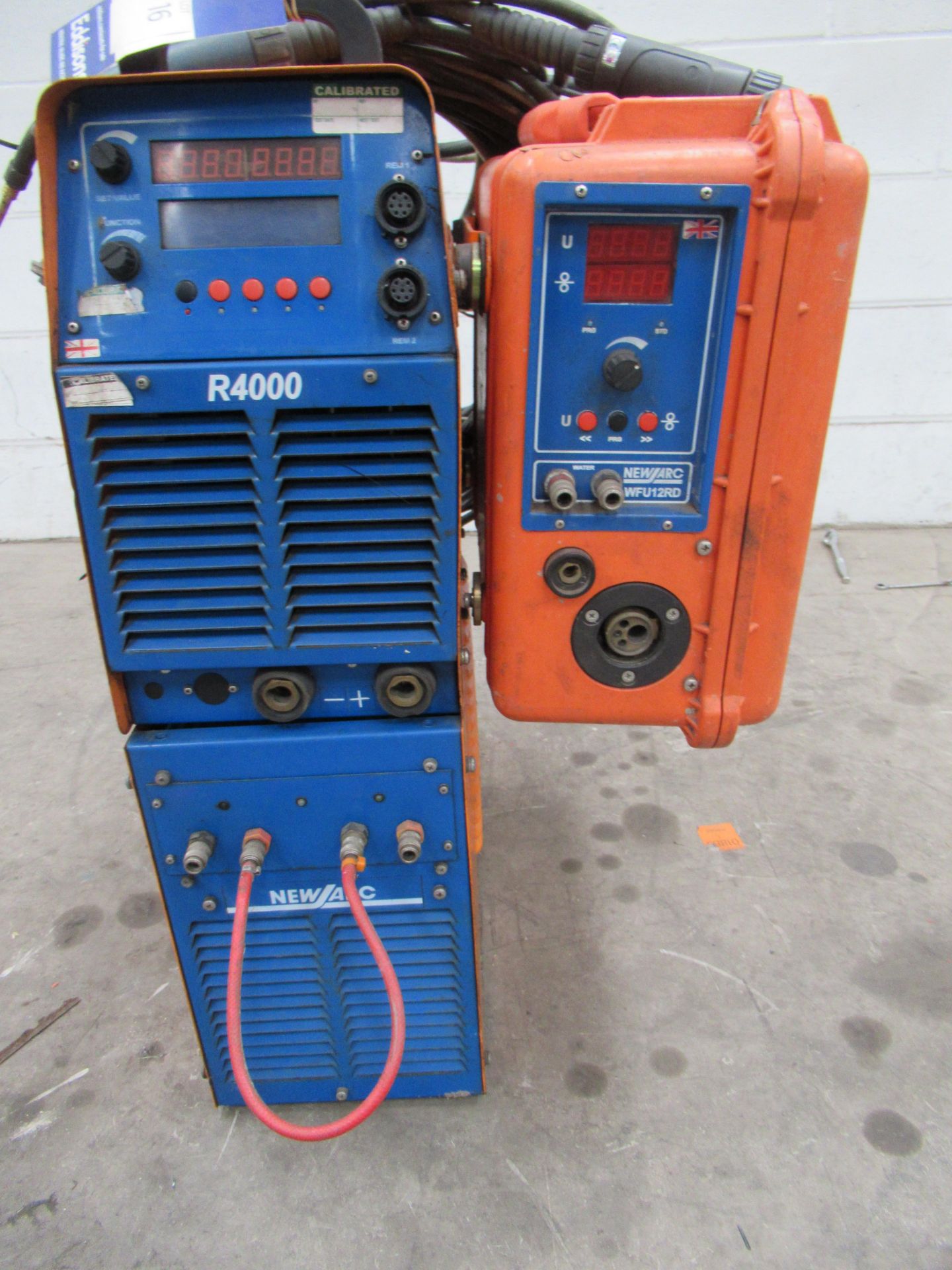 Newarc R4000 MiG welder with water cooler and Newarc WFU12RD wire feed with torch and leads