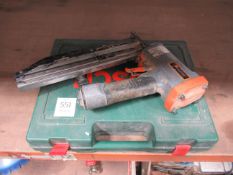 A Bosch PSB 24V VE-2 Battery drill and a Paslode pneumatic nail gun