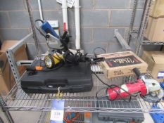 Shelf of hand tools including power devil angle grinder, JCB drill, soldering kit etc
