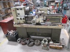 Harrison M300 metalworking lathe 415V, along with a quantity of lathe tooling, chuck heads etc.