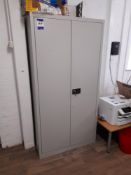 Bisley metal double door cabinet, with contents to include stationary, PPE etc.