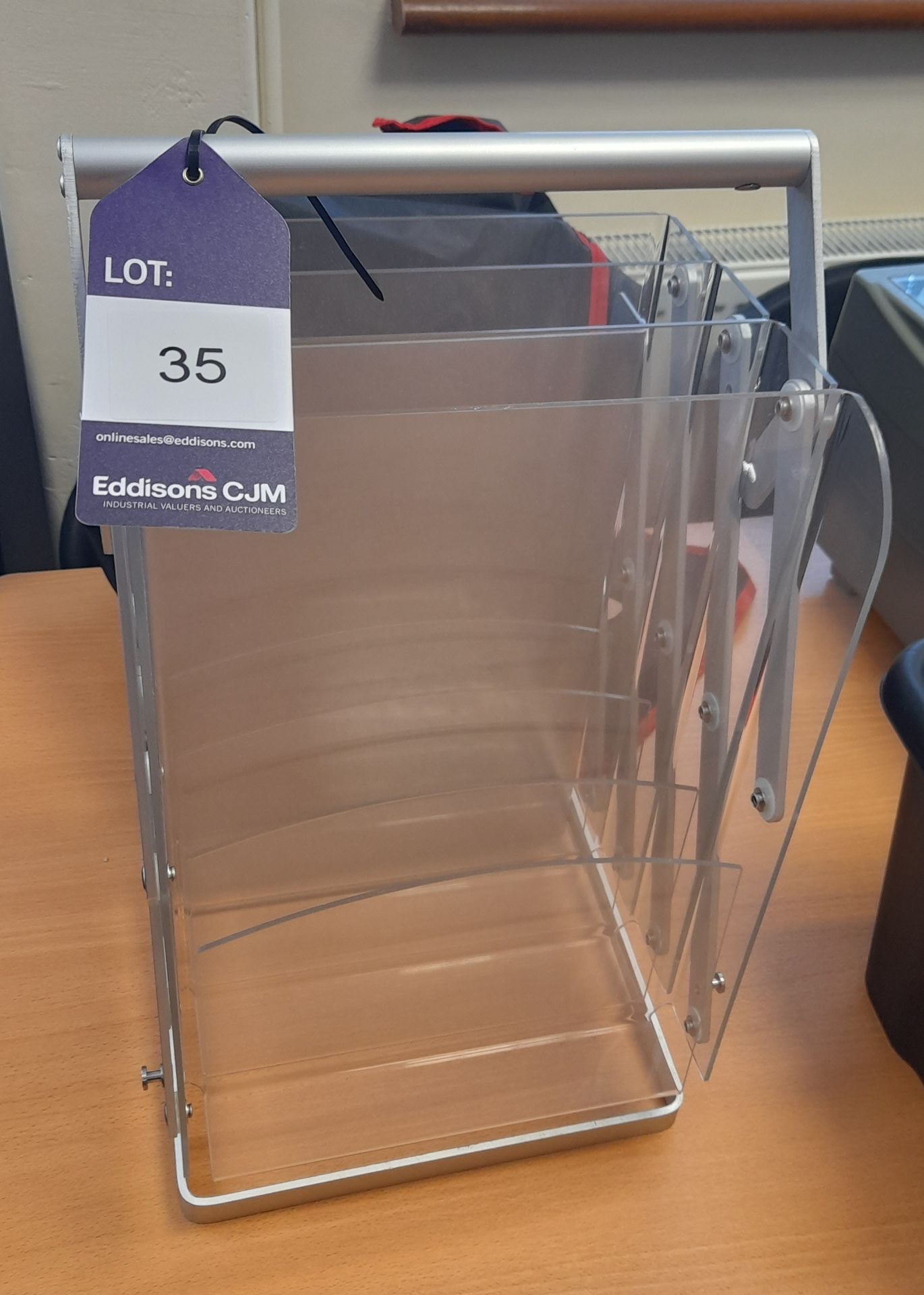 Extendable handheld leaflet rack