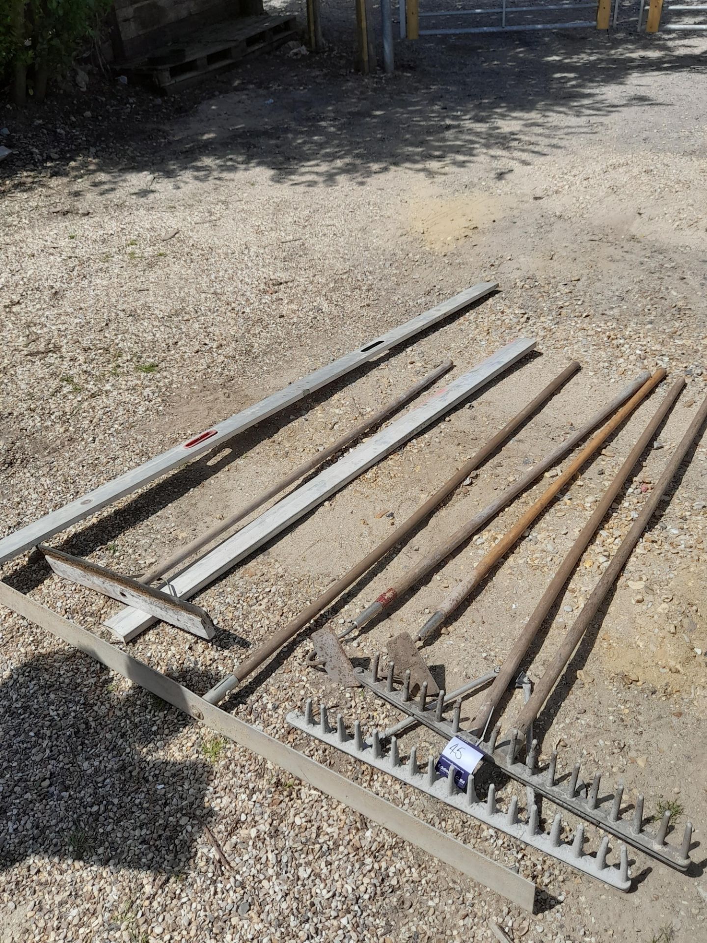 Small Quantity of Screeding Tools to include Rakes, Screeding Levels, etc.