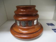 Wooden trophy stand with reward plaques dating to 1890