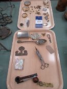 Tray of various collectables including sovereign scales, compacts, belt buckles, candle snuffer, smo