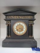 Roman temple inspired slate and brass mantle clock from Wilson-Paris