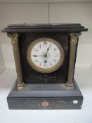 Slate mantle clock with ornate pillars and marble features