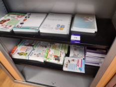Assortment of training / first aid books