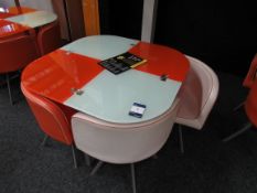 Glass topped table with 4 chairs