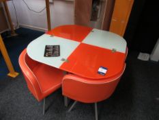 Glass topped table with 4 chairs