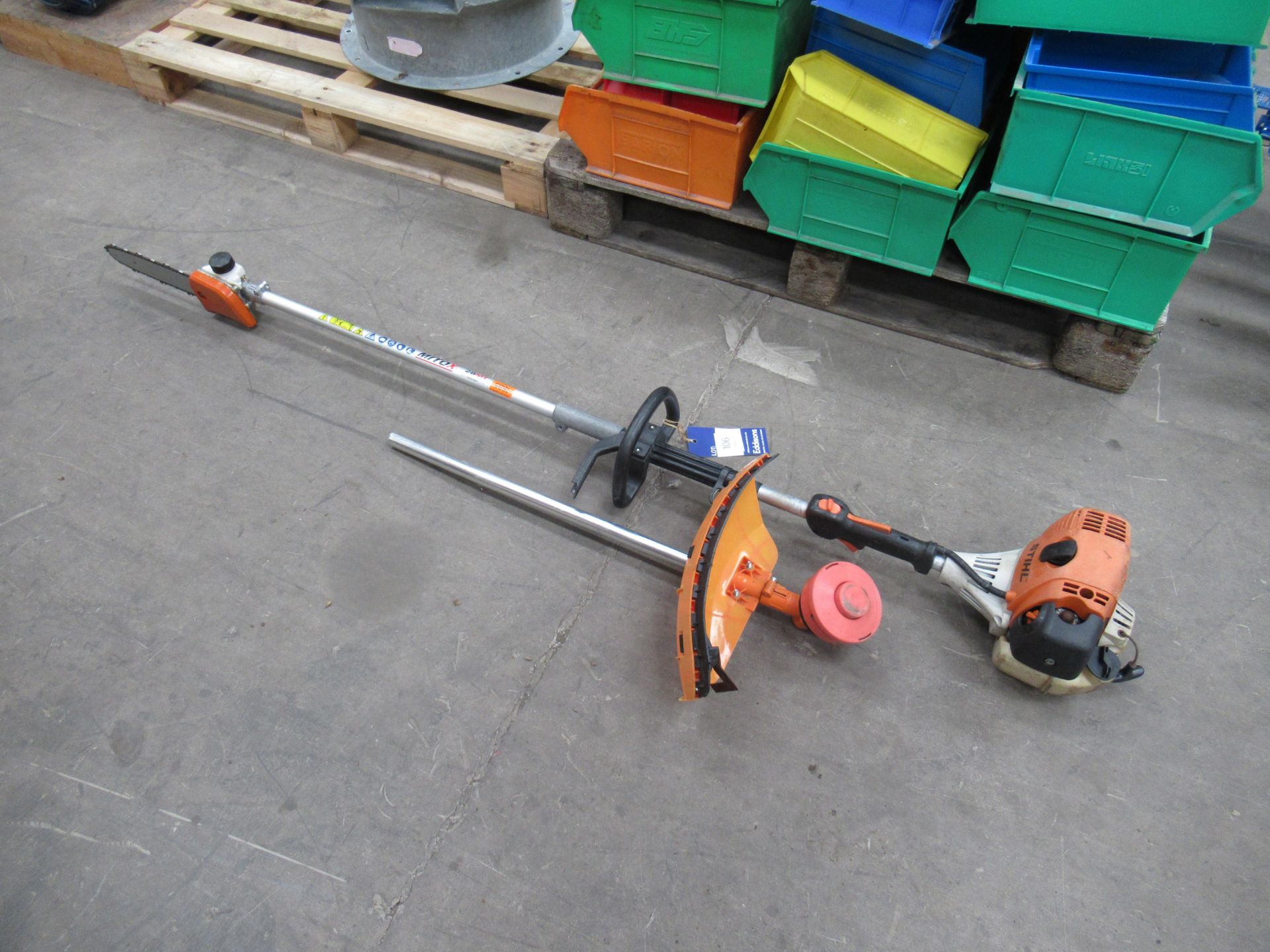 A Stihl multi-tool engine with a Mitox chainsaw head and an unbranded strimmer head (spares/repairs)