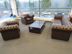 Leather Chesterfield furniture suite, to include sofa and 2 x armchairs, with low level table, to