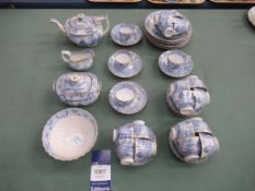 An Oriental Themed Blue & White Tea Service with Gold-Painted edging.
