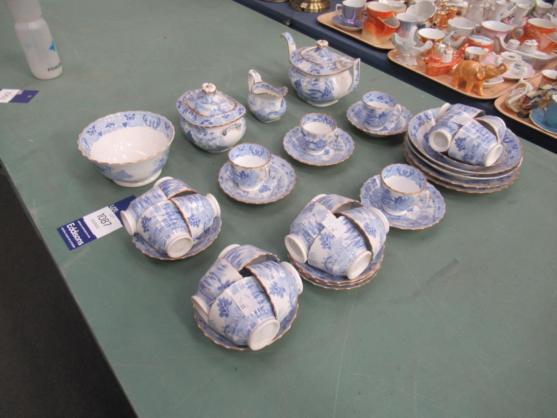An Oriental Themed Blue & White Tea Service with Gold-Painted edging. - Image 3 of 4