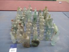 Selection of Various Glass Bottles including dairy, sauce, chemist bottles.
