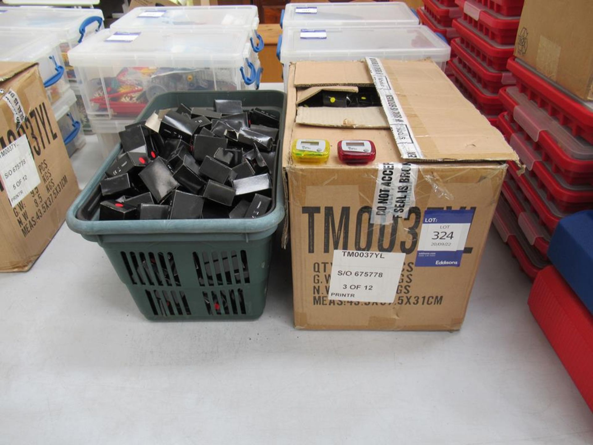 Large qty of red and yellow Lincoln Imp pedometers to plastic crate and box - Image 2 of 2