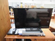 Panasonic 32" Television with Panasonic DVD/VHS Player & another DVD Player