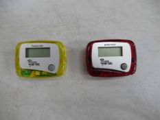 Large qty of red and yellow Lincoln Imp pedometers to 2 cardboard boxes