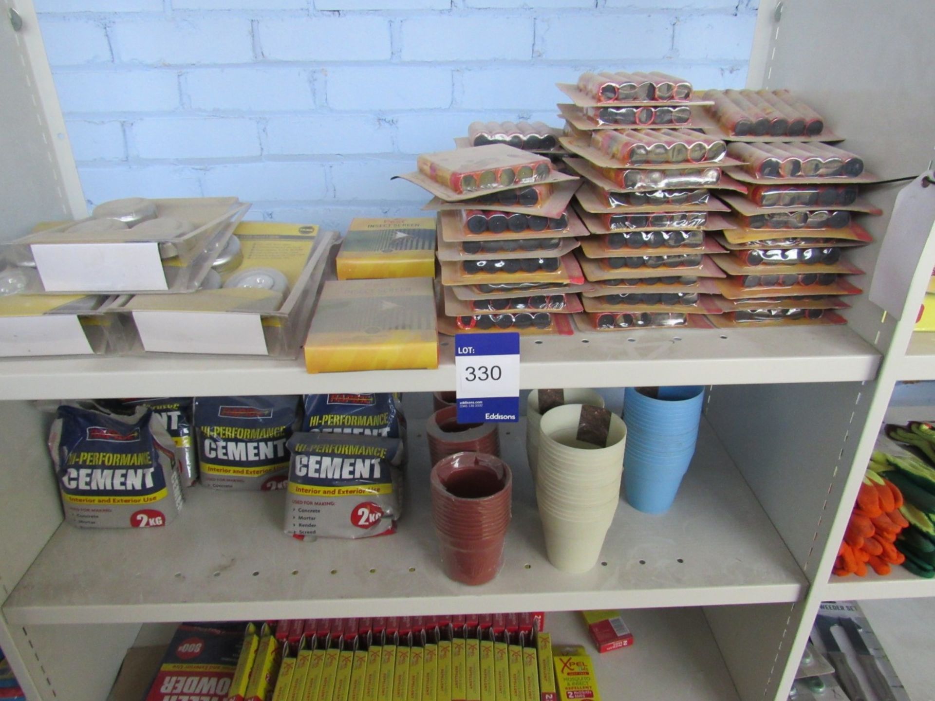 Contents of bay of shelving to include rapide cement, mosquito bands, plant pots and insect catchers - Image 2 of 3