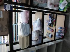 Contents of bay of shelving to include child’s socks, blankets etc – shelving included