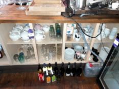 Quantity of various crockery and glasses under the bar