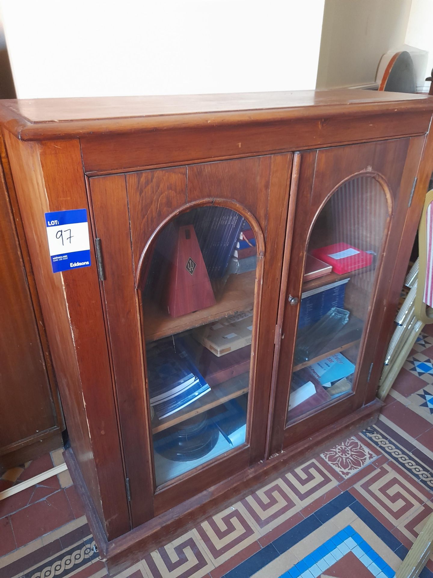 Victorian pine glazed bookcase & contents