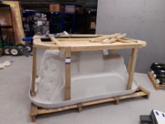 Part complete hot tub comprising fibreglass hot tu