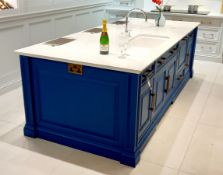 Royal Blue in frame island unit with silestone worktop. To include Kohler sink & Perrin & Rowe