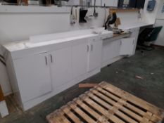 Fitted workbench with various drawers and cupboard