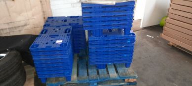 Quantity of Small Plastic Stacking Pallets.