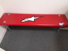 Low level seating bench with Alpinestars decal (Ap