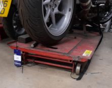 Unknown capacity motorcycle lift on casters