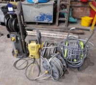 Two Pressure Washers and Three Hose Reals