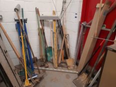 Quantity various rakes, shovels, spades, scrapers, rollers, folding bench etc. to wall/corner