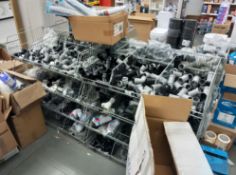 Assortment of Plastic Plumbing Bracketry to 4x Metal Shop Baskets & 2x Bays of Shelving.