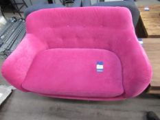 Bold Pink Button Backed Sofa.