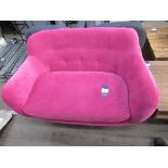 Bold Pink Button Backed Sofa.