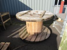 A Large Wooden Cable Reel; ideal for making into a garden table