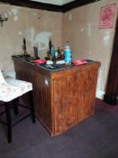 Fitted bespoke wooden bar, with various traditiona