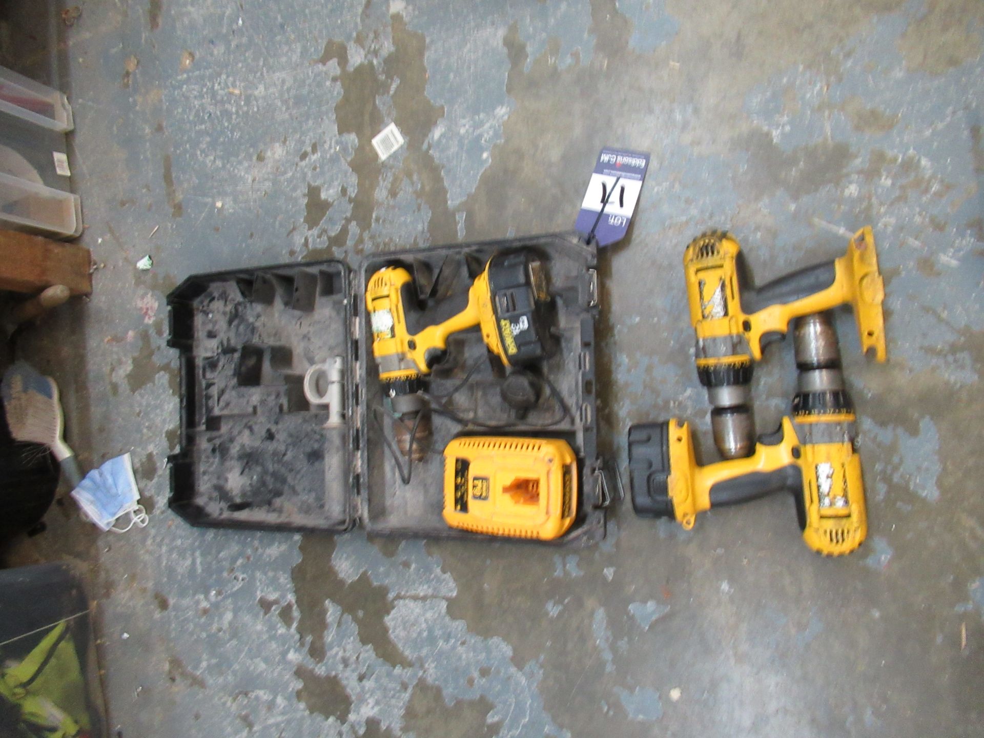 1x DeWalt Cordless Drill with battery and charger in case along with 2x DeWalt Cordless Drill Bodies