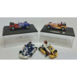 Scalextric C2201 Caterham 7, Comma no.27, boxed; another C2231 Comma No 28, boxed; a Ninco 50214