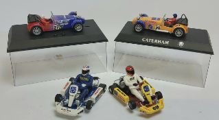 Scalextric C2201 Caterham 7, Comma no.27, boxed; another C2231 Comma No 28, boxed; a Ninco 50214