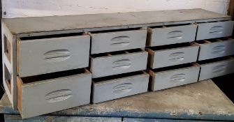 Interior Design - a bank of eleven industrial drawers, 117cm x 31 x 22cm