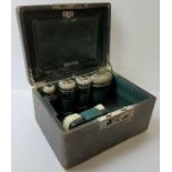 An early 20th century Moroccan leather travelling vanity set, complete with silver plated vanity